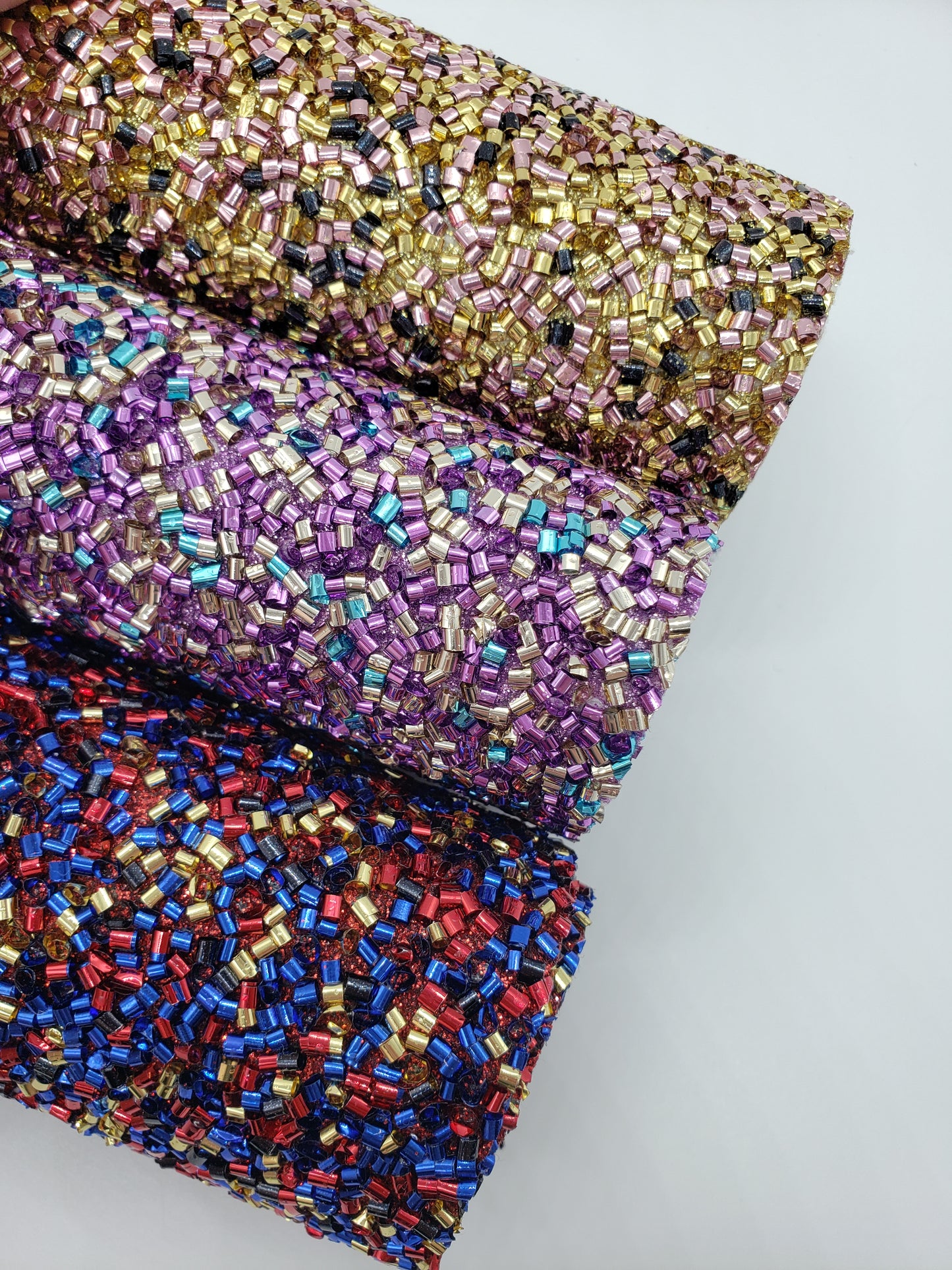 Rolled tinsel fabric sheets